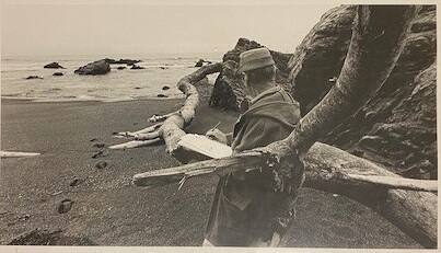 Phil Dike with Trunk of Driftwood